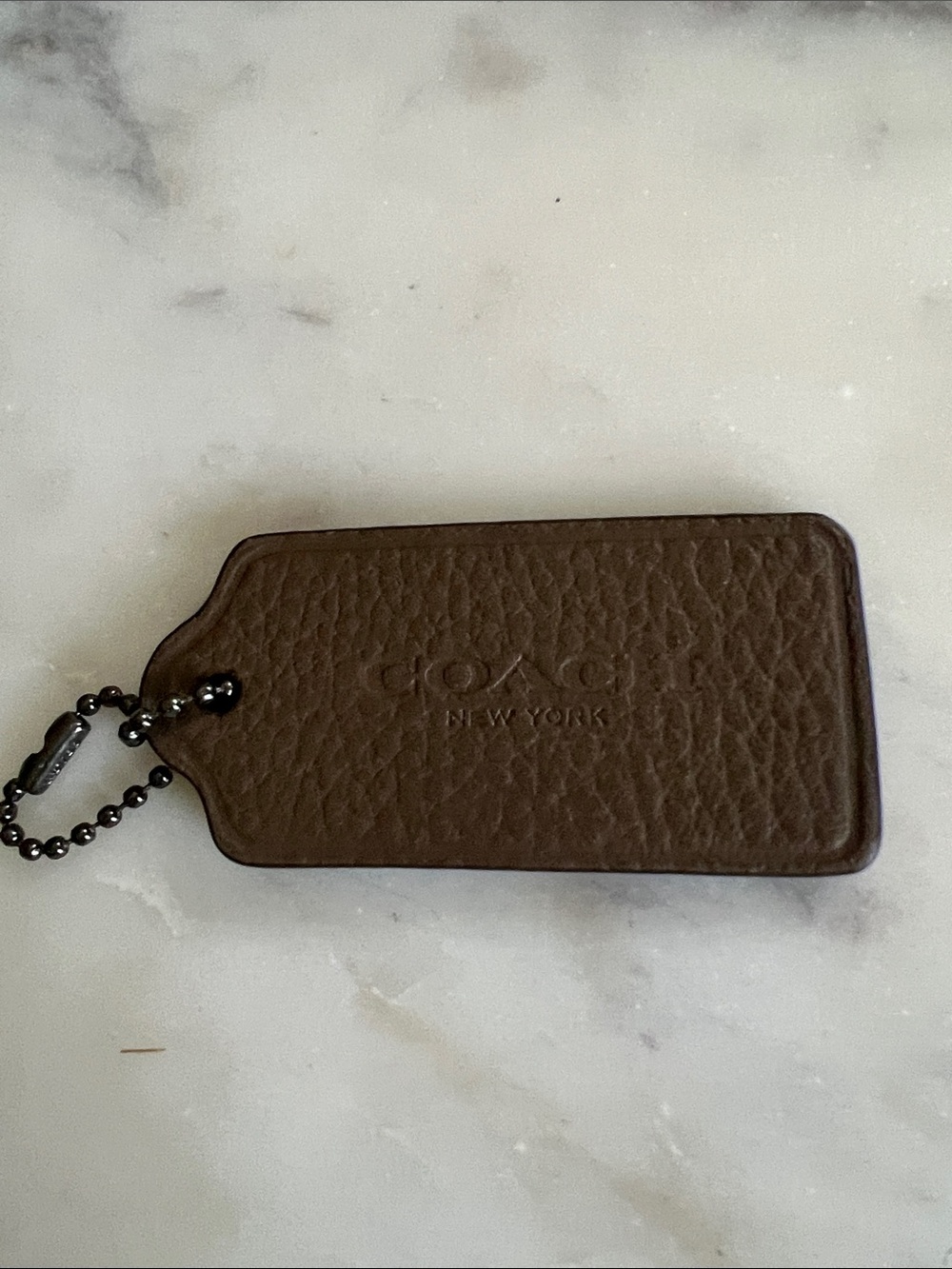 Coach Pebbled Leather Luggage Tag in Taupe with Chain.